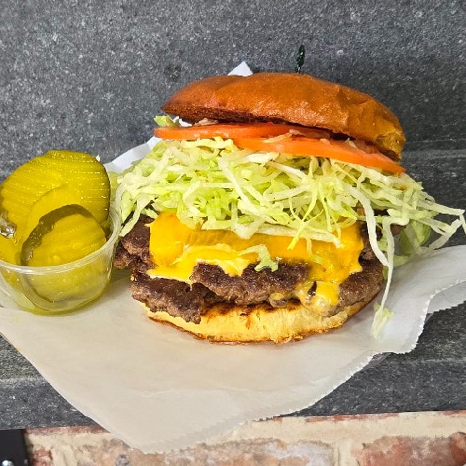 Indulge in Our Double Cheeseburger